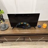 Dark-tinted mindi sideboard