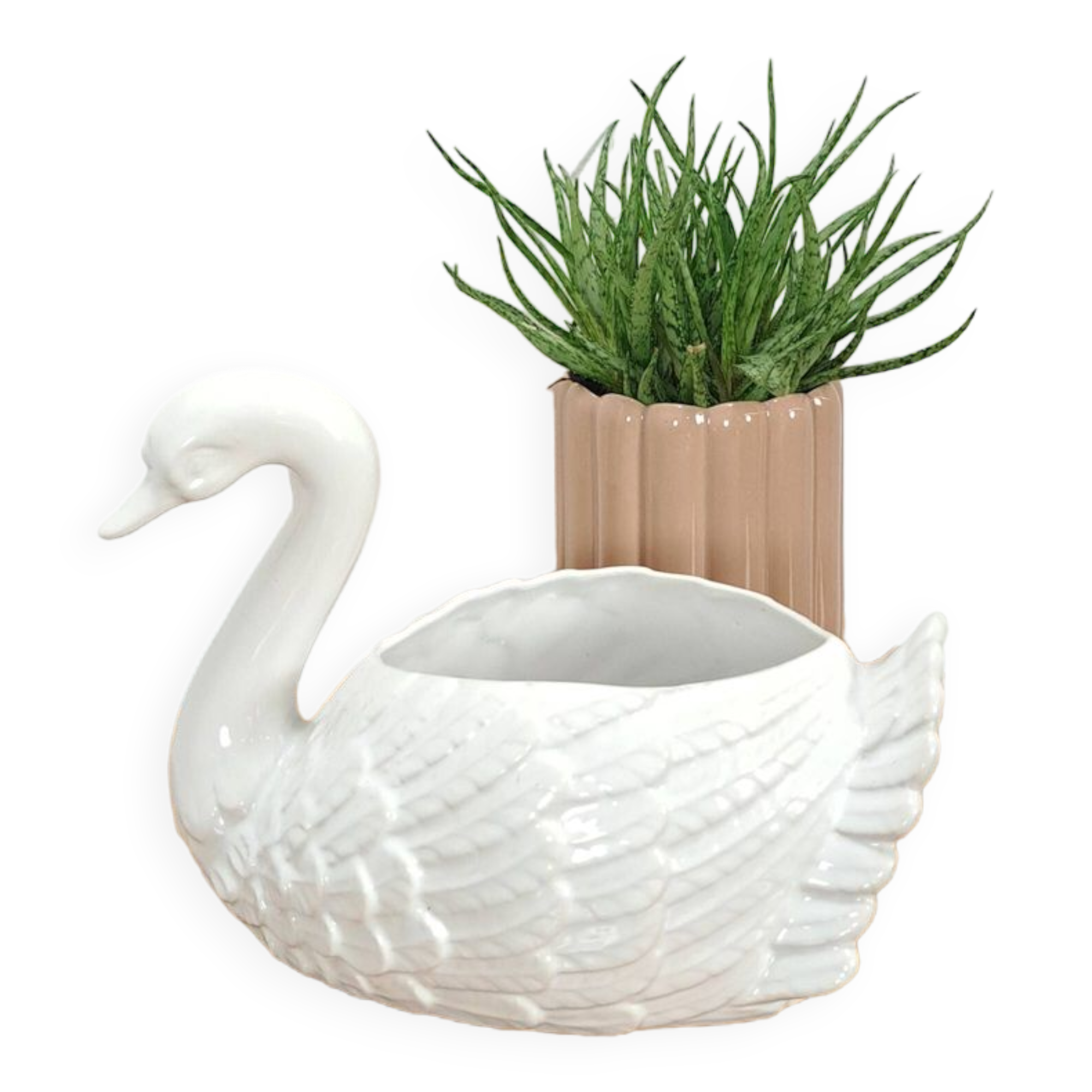 vintage porcelain flower pot in the shape of a swan