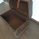 Wooden trunk with leather and metal, ultra chic and elegant in a living room or bedroom.