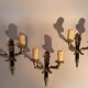 Set of 3 Empire style wall lights in bronze and gilded and green lacquered brass, Circa 1950.
