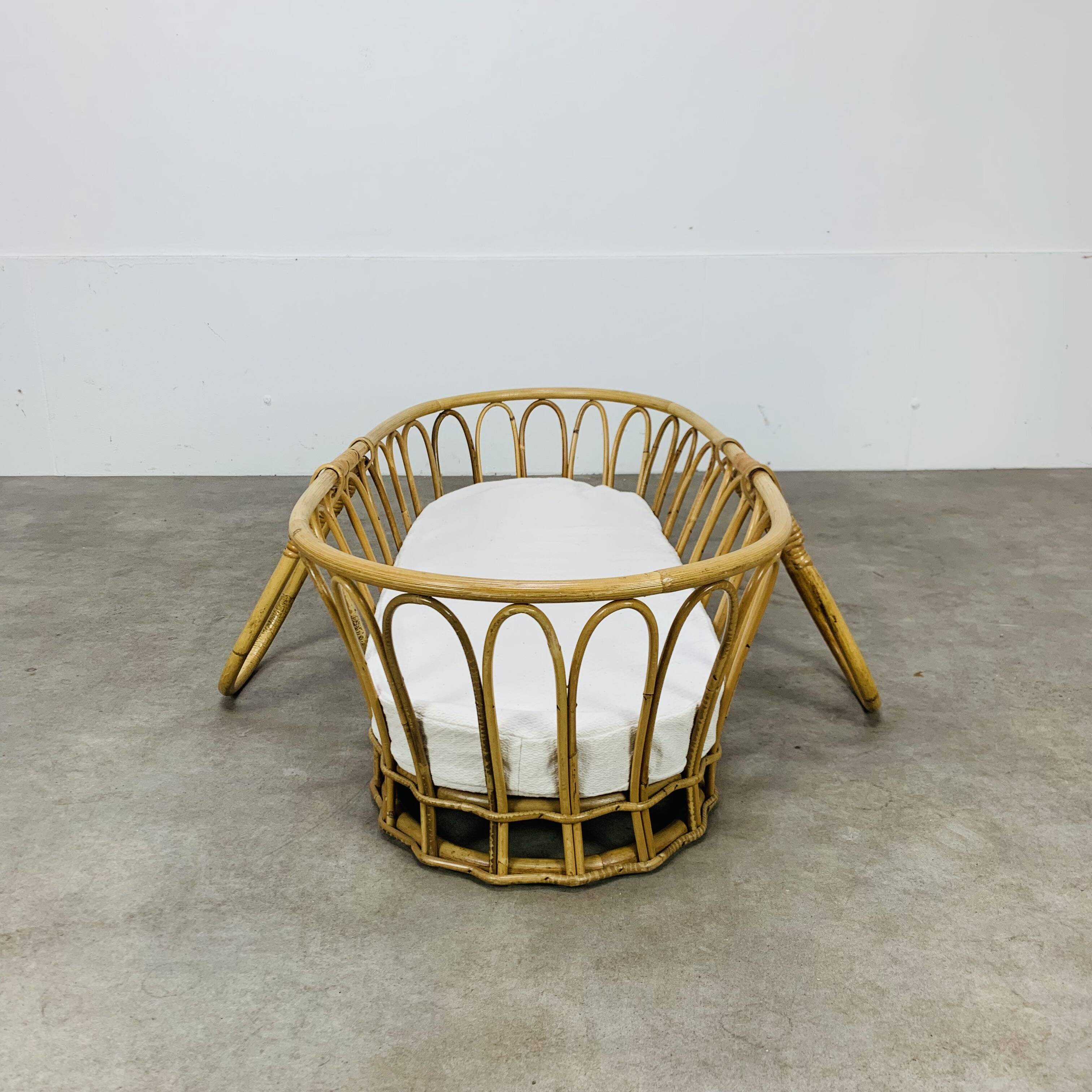 Vintage rattan baby bassinet