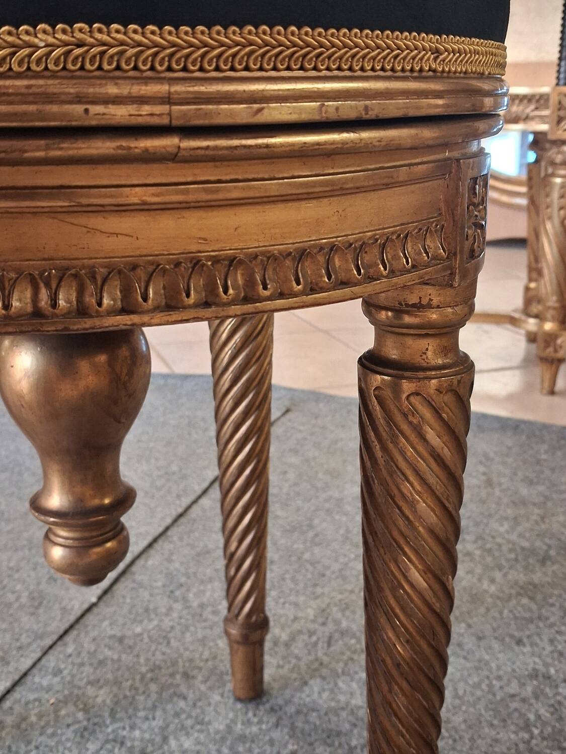 Golden wooden piano stool