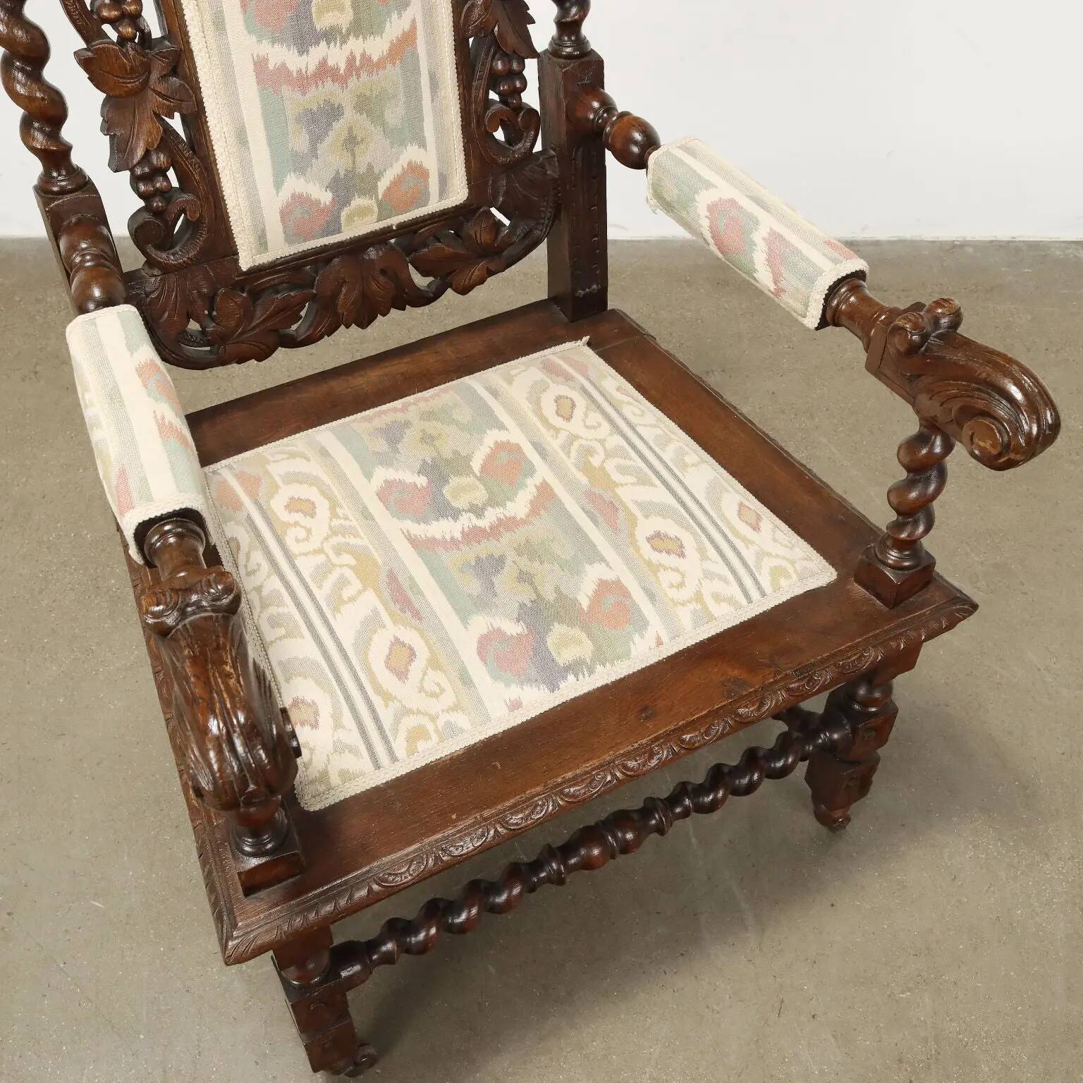 Antique Neo-Renaissance armchair in oak and fabric, 19th-20th century.