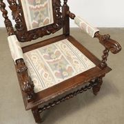 Antique Neo-Renaissance armchair in oak and fabric, 19th-20th century.