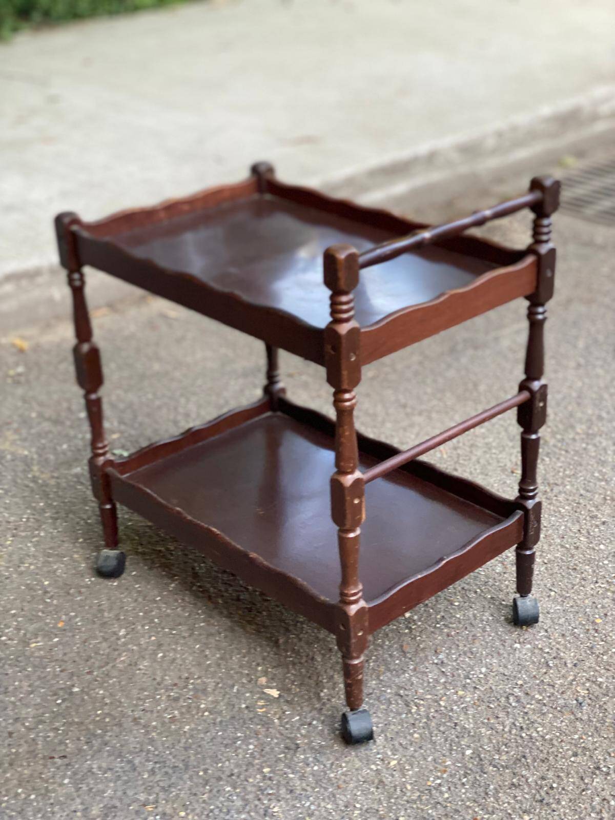 Solid wood serving trolley on wheels