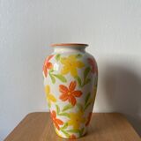 White vase with flowers