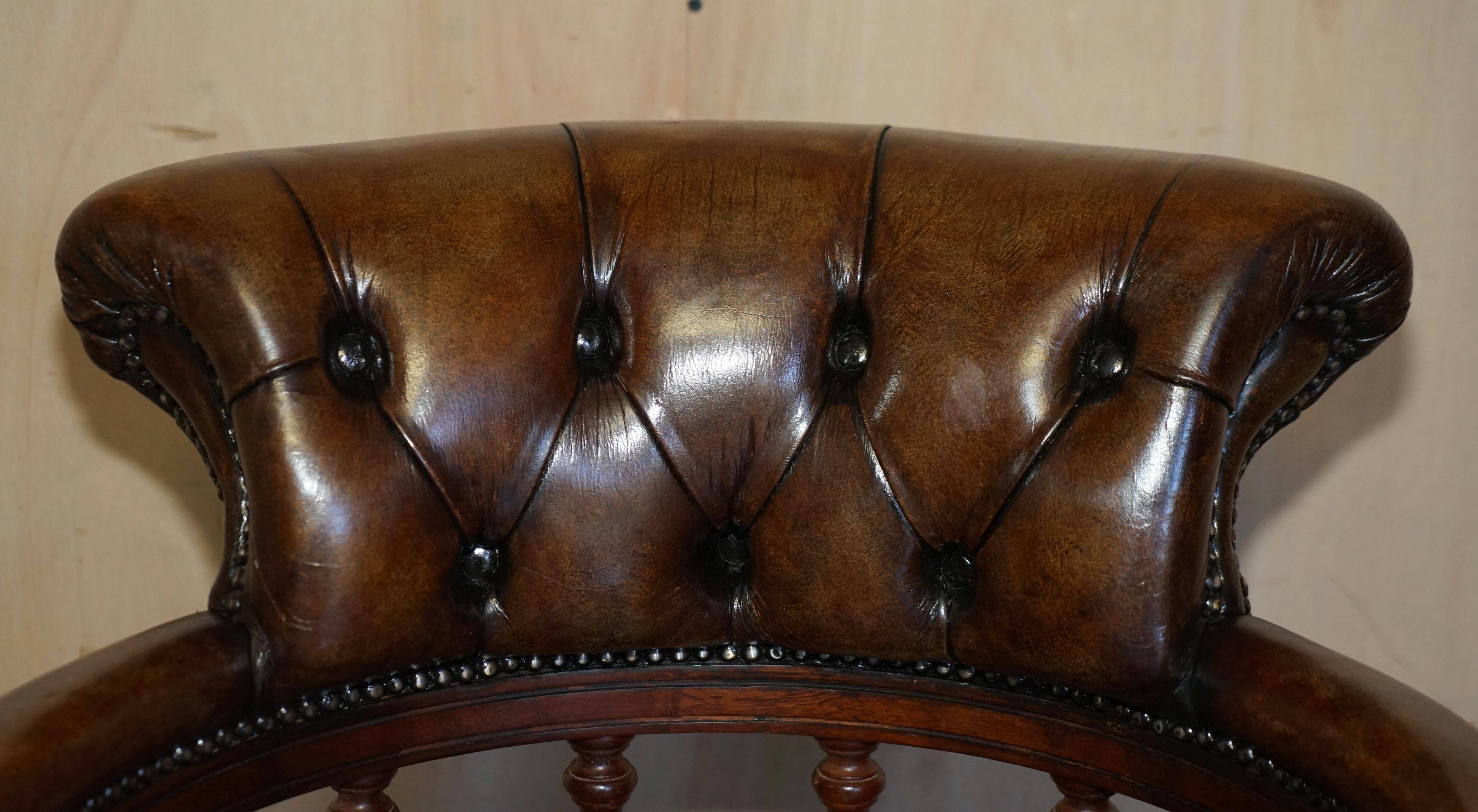 Vintage Chesterfield captain's chair in leather