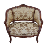 Louis XV shepherdess armchair in carved walnut