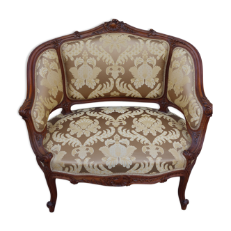 Fauteuil bergère louis XV en Noyer sculpté