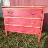 Matte gold and red patinated chest of drawers