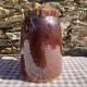 Old glazed terracotta pitcher