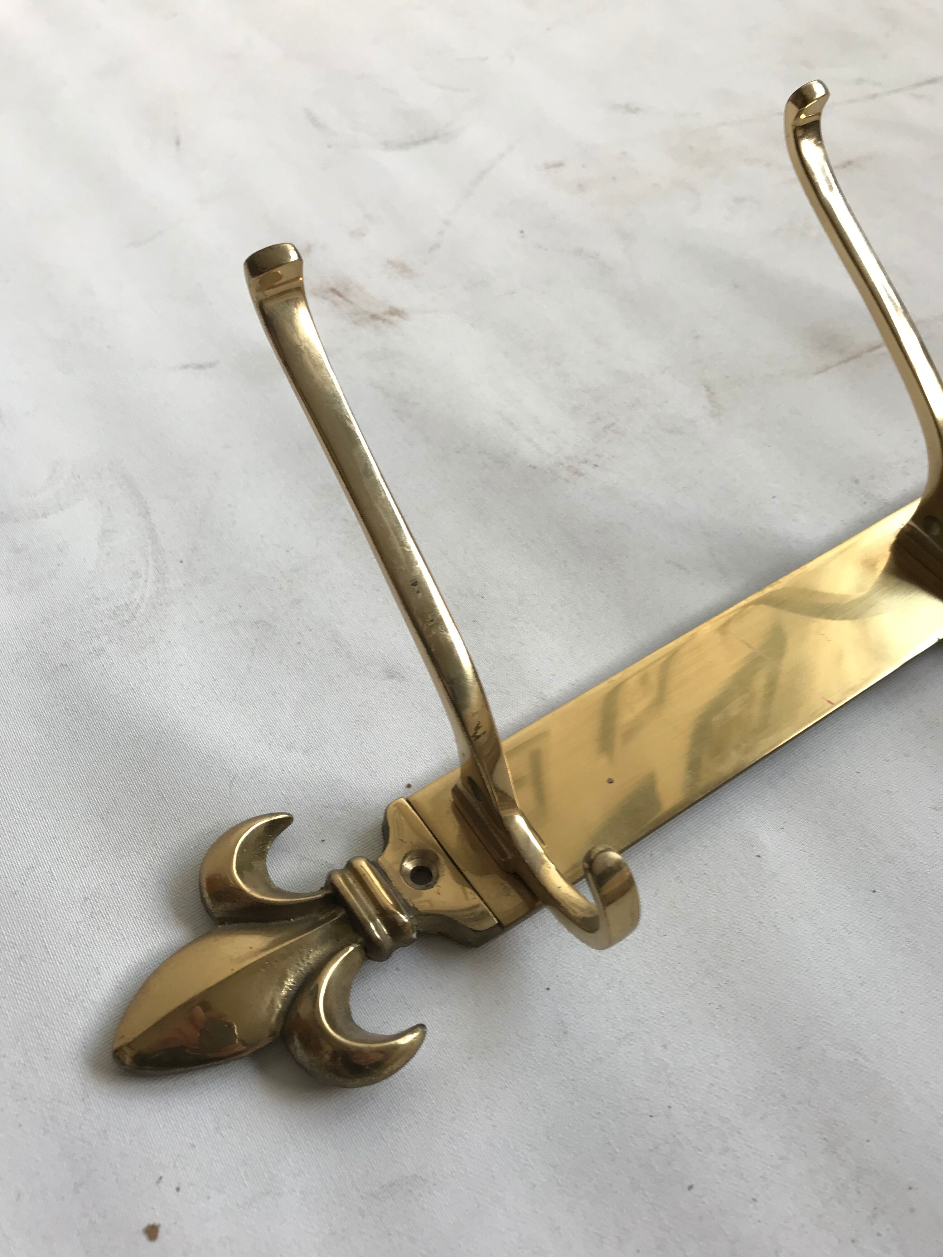 Golden brass wall rack