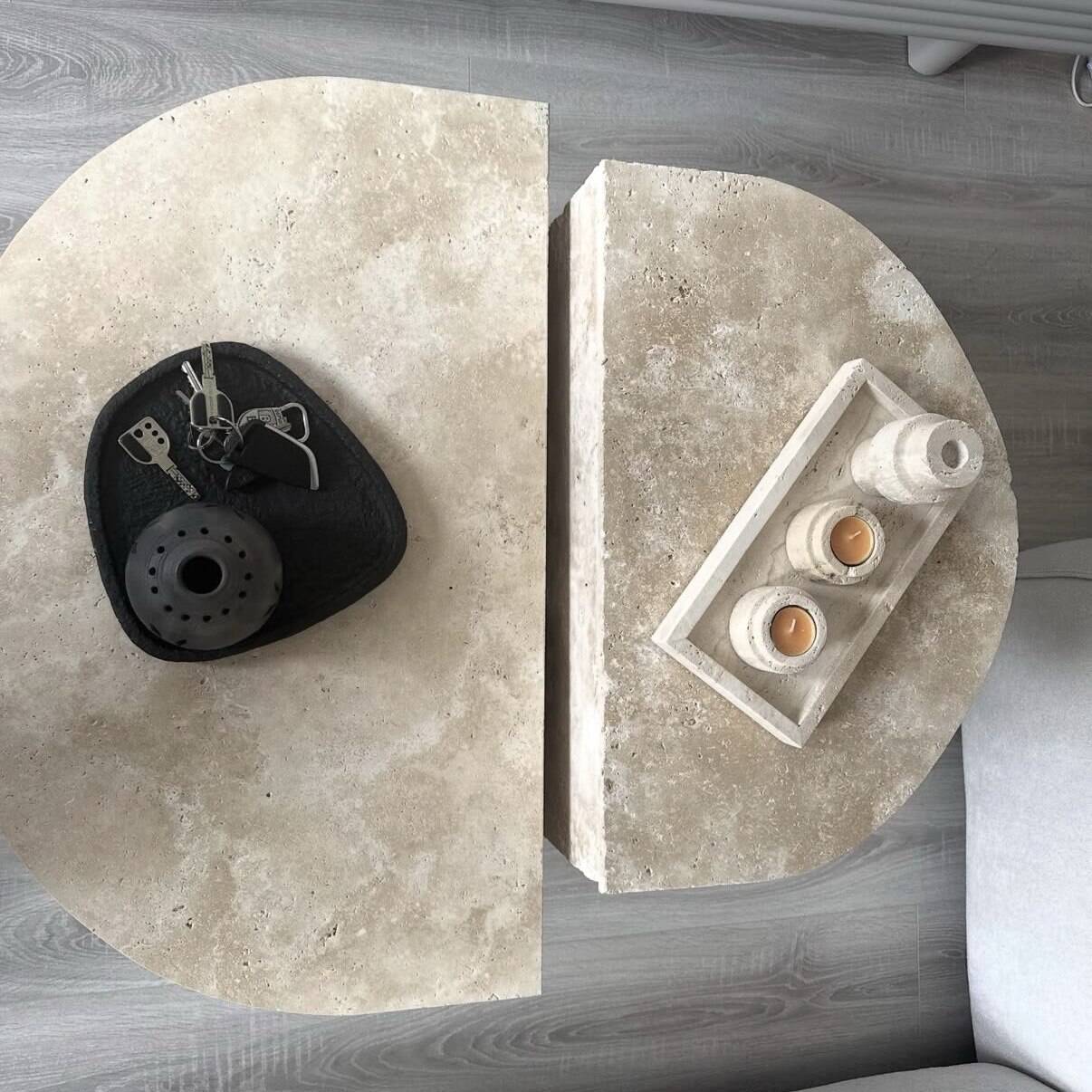 Half-moon travertine coffee table