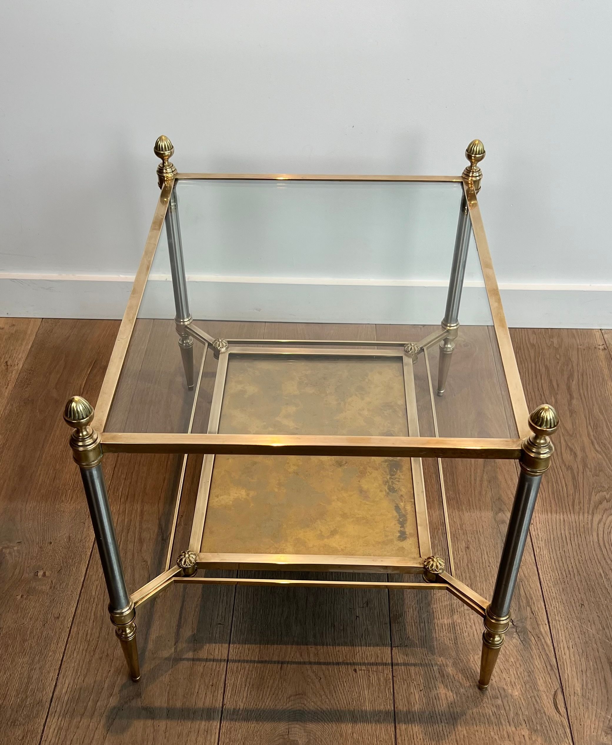 Pair of neoclassical side tables in steel and brass by Maison Jansen.
