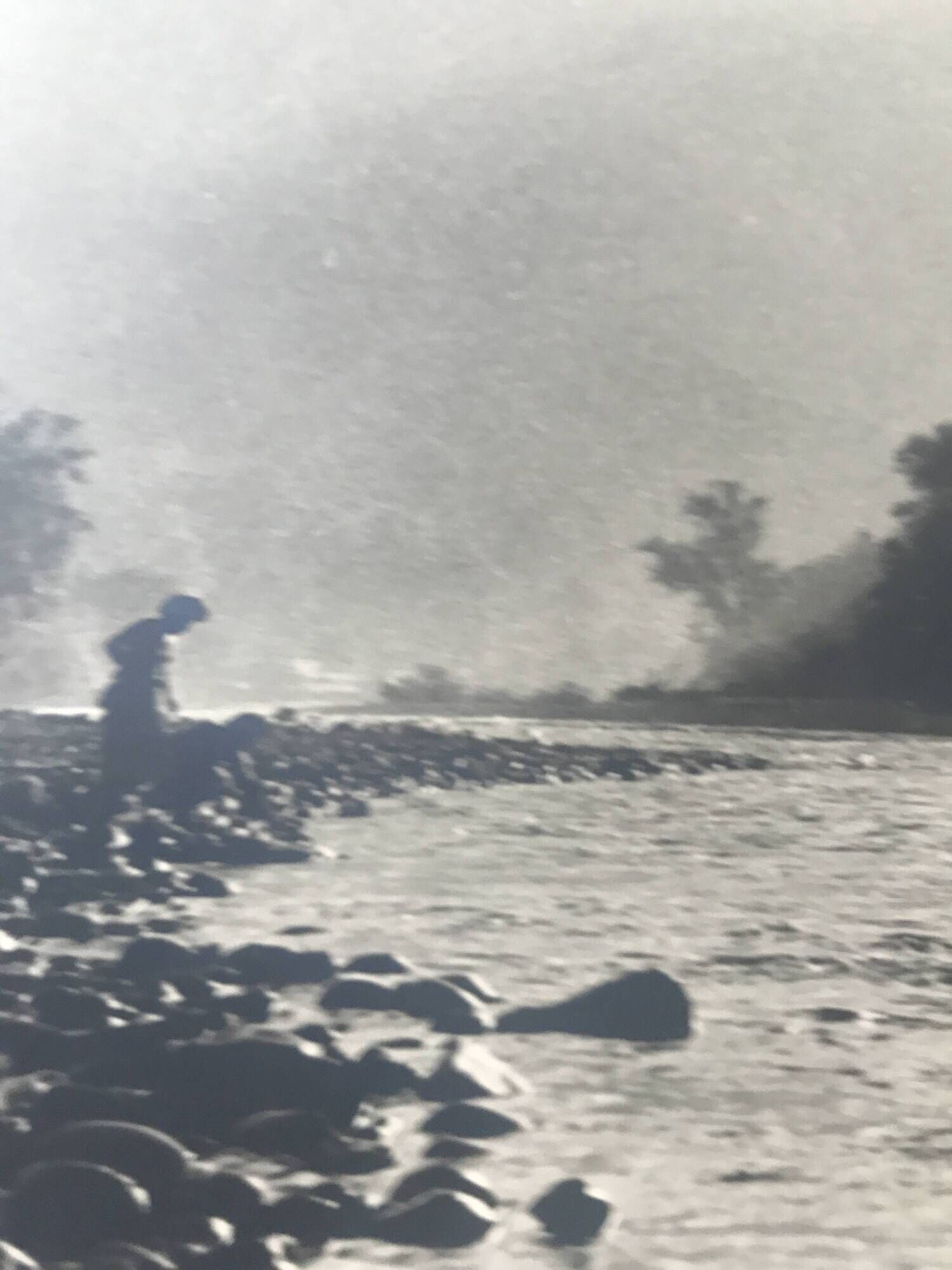 River landscape with characters, 60s/70s. Black and white silver print.