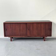 Vintage enfilade in teak and leather, 1970s.