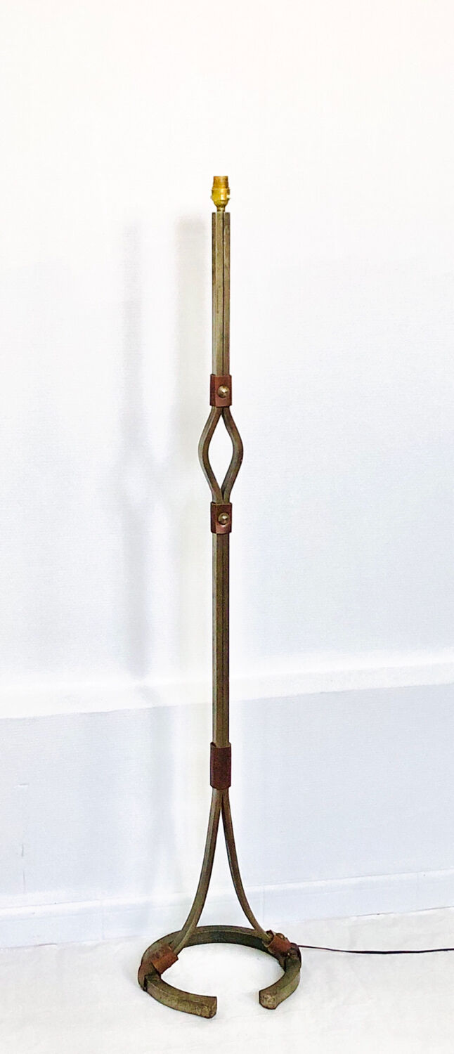 Hammered wrought iron and leather floor lamp by Jean Pierre Rickaert, 1950s