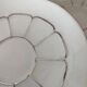 White and silver Limoges porcelain coffee cups and saucers.
