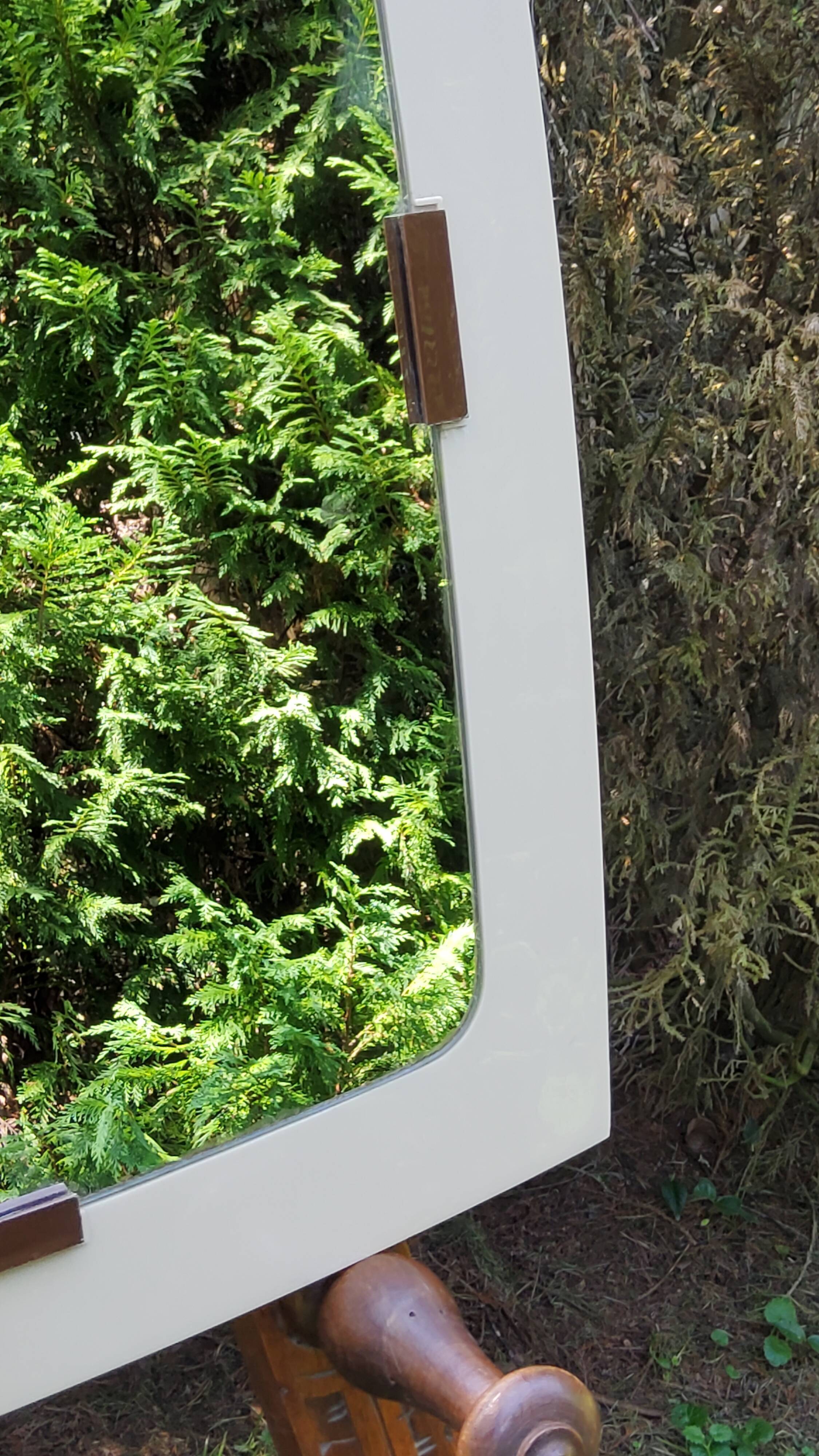 Beige and brown plastic mirror from the 70s