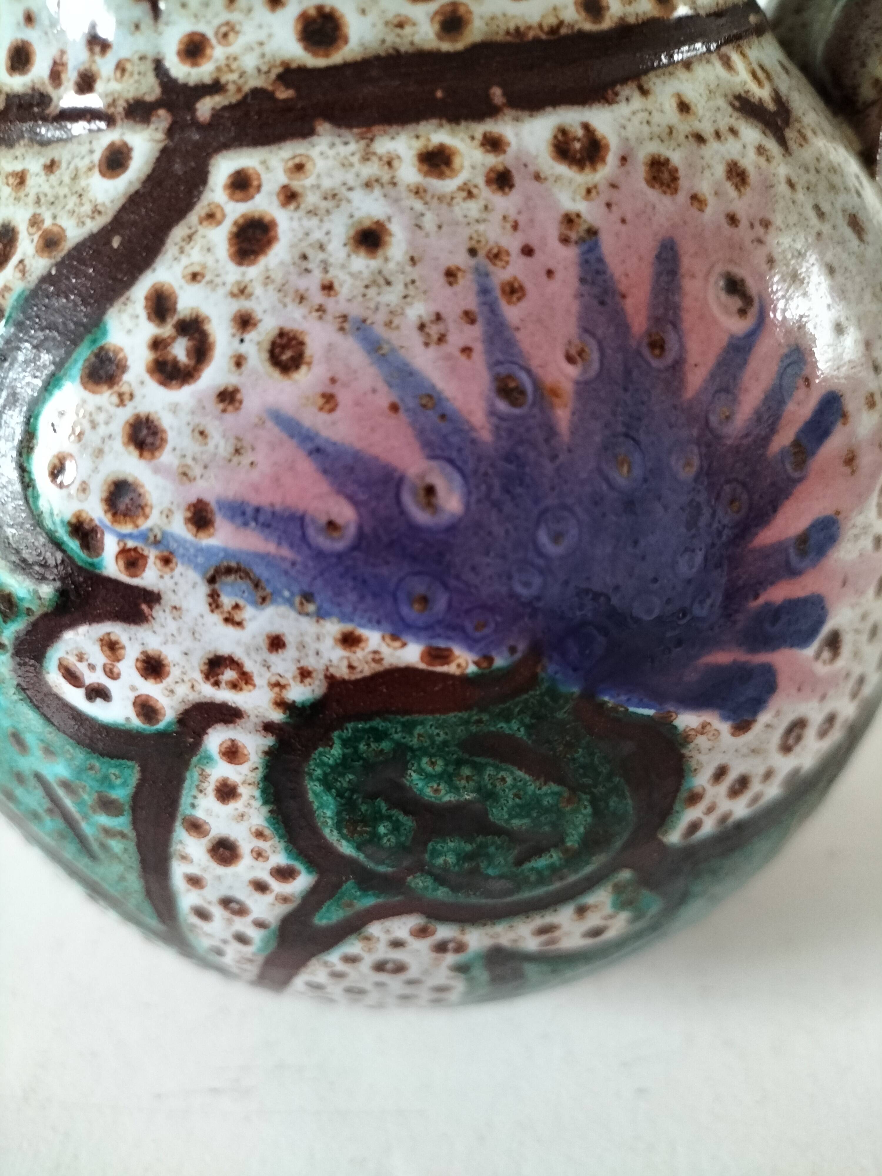 Pitcher with thistle motif by André Georges Pougues les Eaux