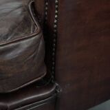 Set of two characterful sheepskin armchairs with a beautiful deep colour