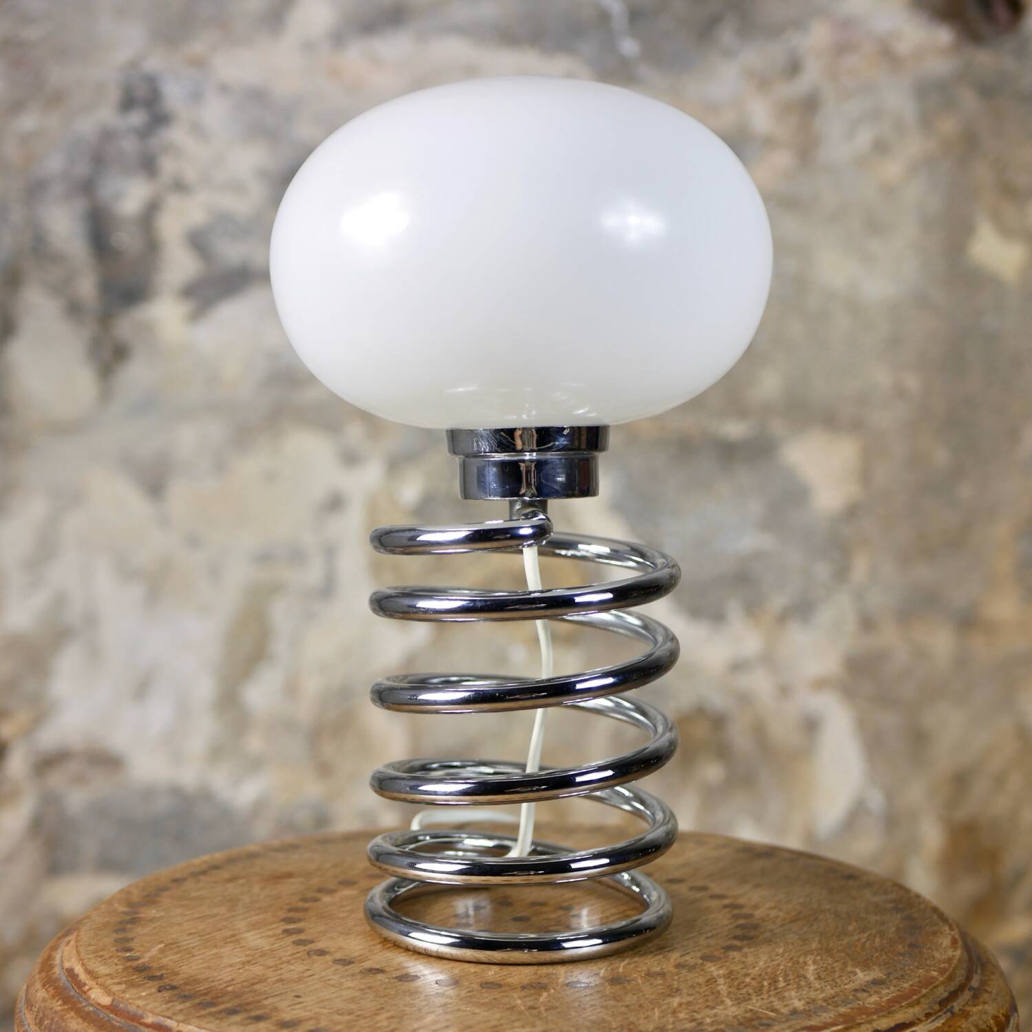 Chrome spring lamp