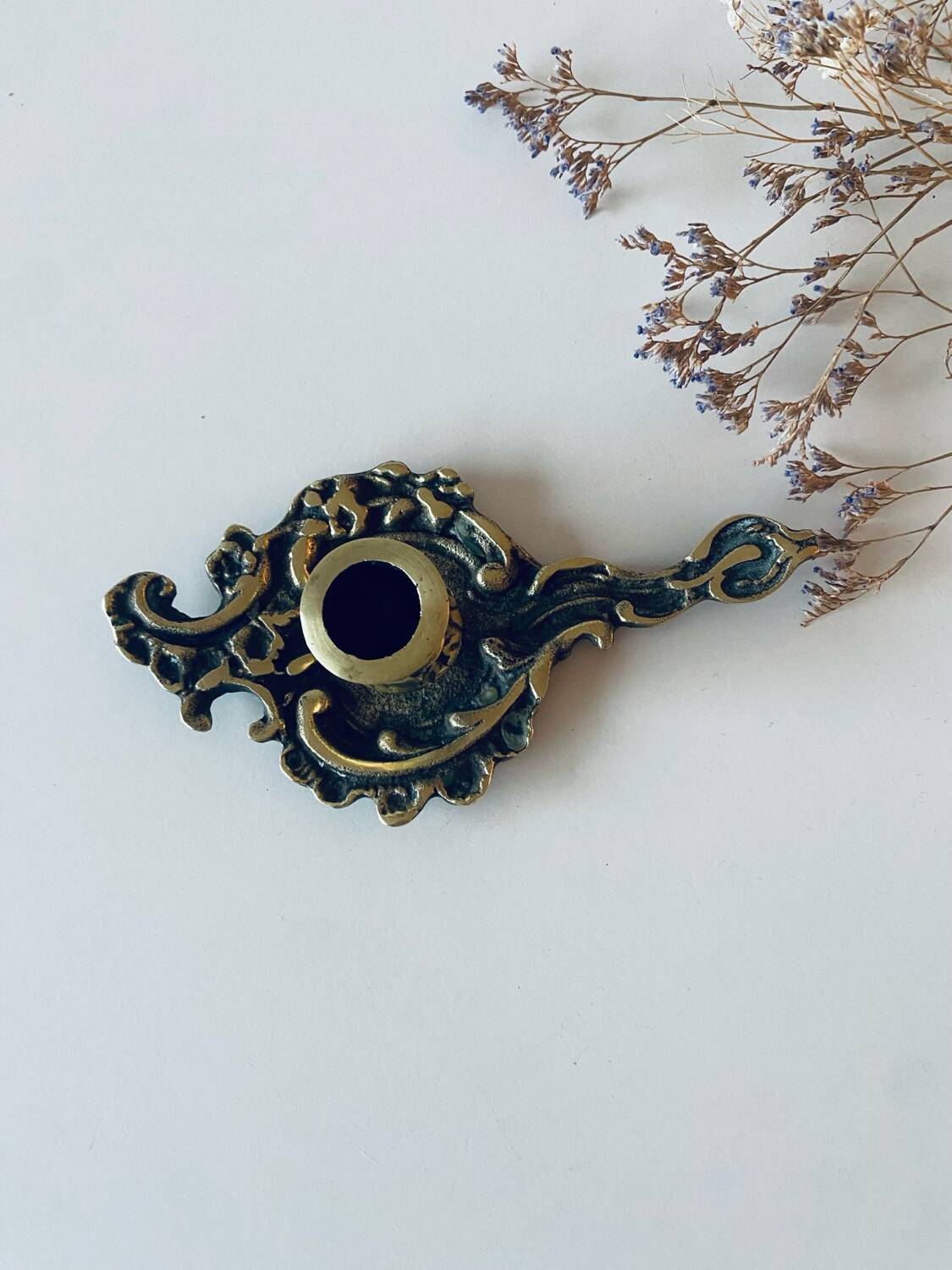 Antique bronze candle holder