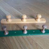 Wall-mounted coat rack with 3 mushroom-shaped hooks
