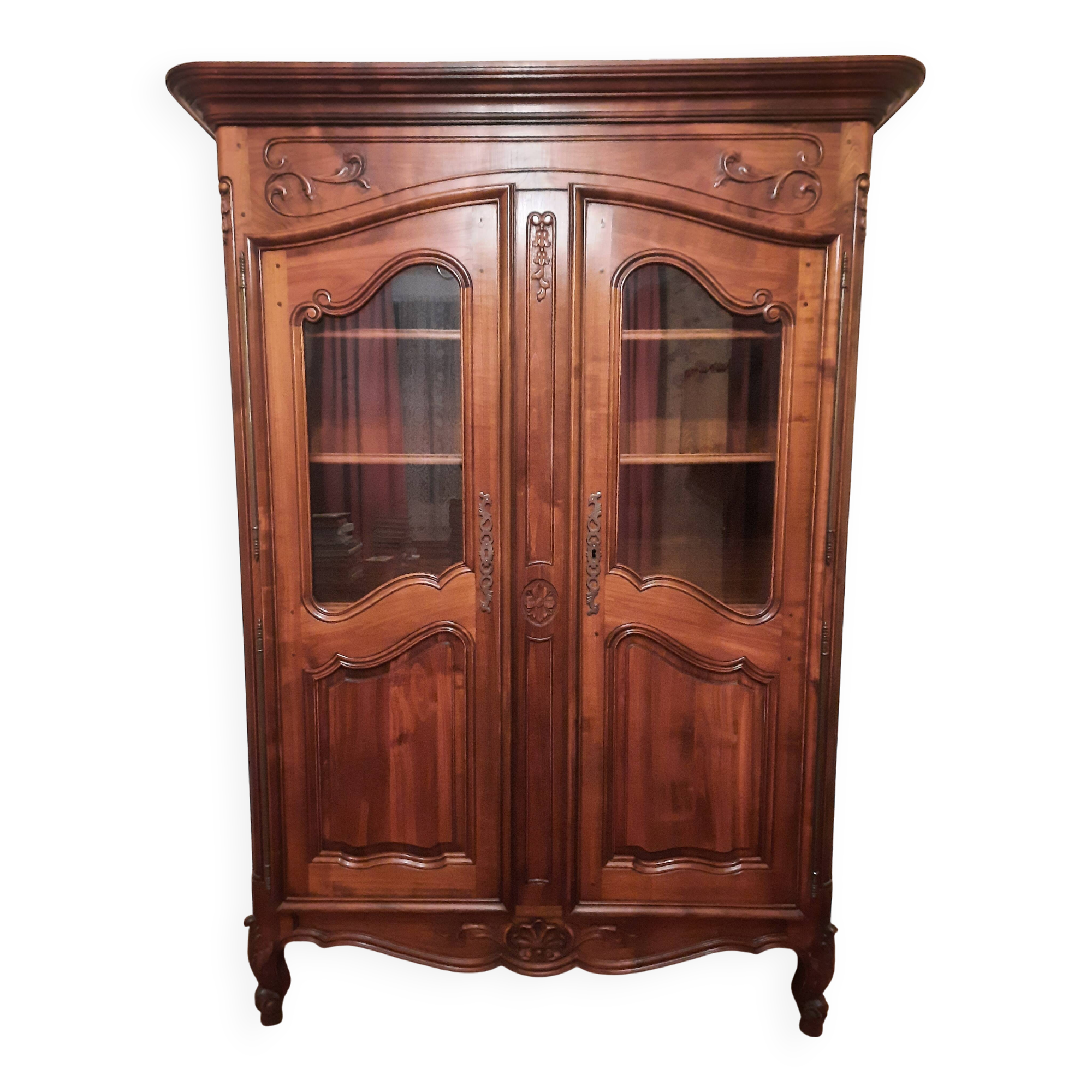 Regency bookcase in solid cherry wood stained walnut.