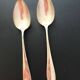 2 large silver-plated metal spoons (19th century)