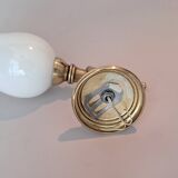 Golden brass wall light from the 1950s.