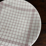 Vintage shallow plate with towel pattern Gien