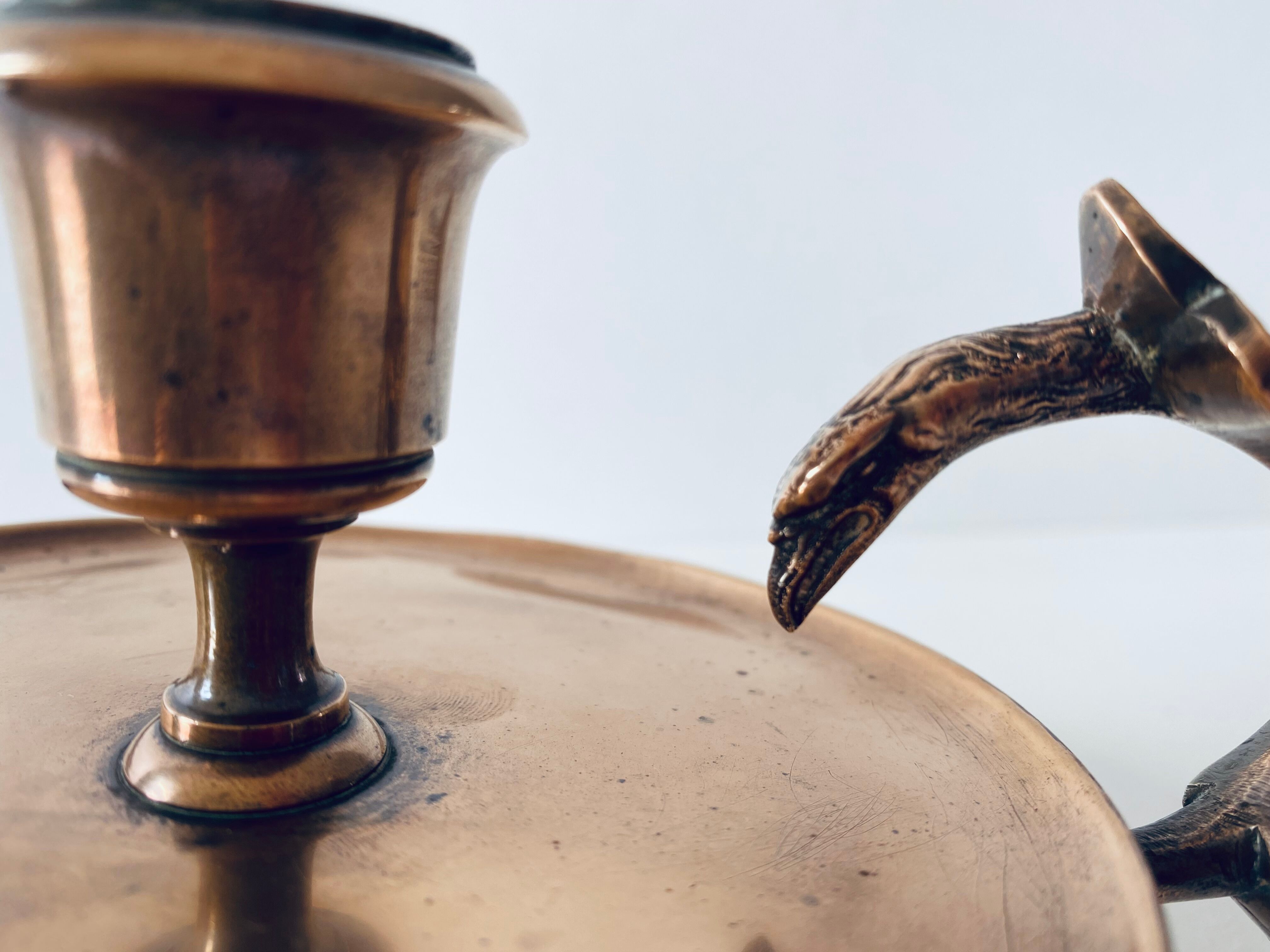 Eagle head candle holder