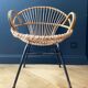 Paire de fauteuils corbeille en rotin - vers 1960.