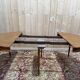 Round dining table with leather top in Louis XVI style.