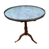 Gueridon dessu marble