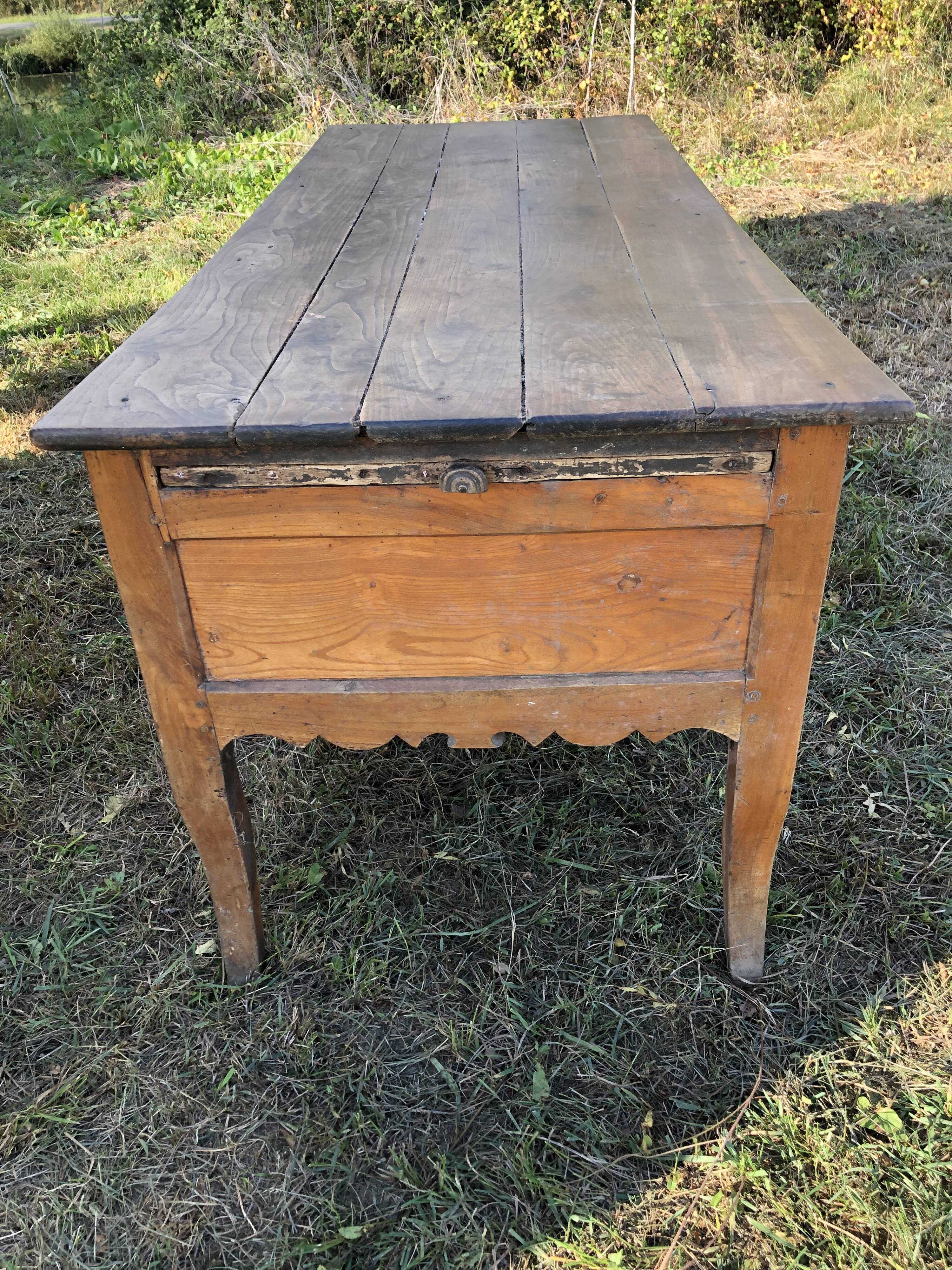 Antique Louis XV paneled table with 3 front drawers in solid cherry wood