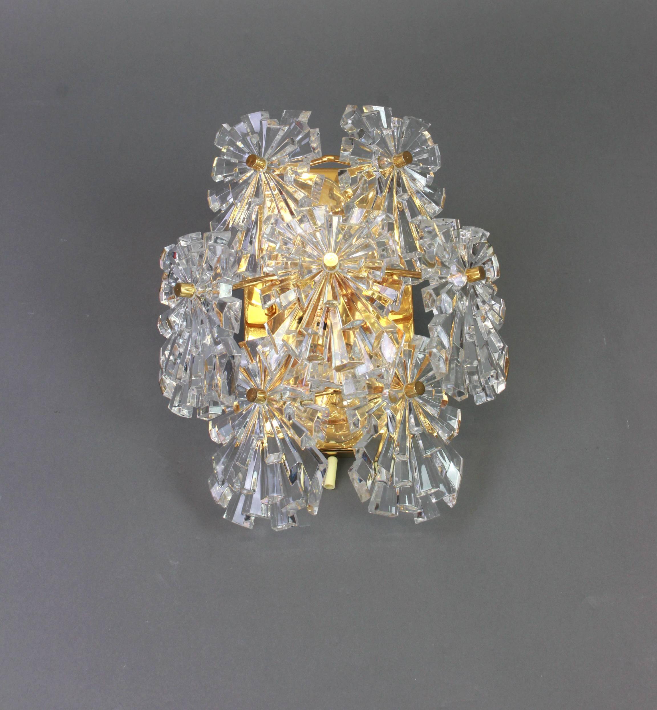 Magnificent pair of crystal wall lights by Kinkeldey, Germany, 1970s.