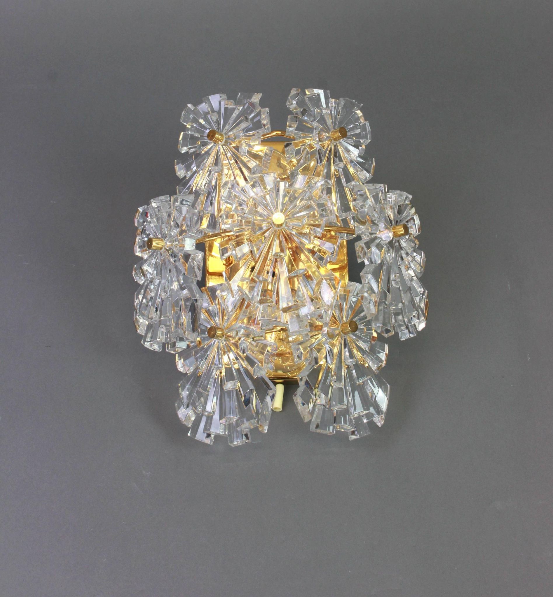 Magnificent pair of crystal wall lights by Kinkeldey, Germany, 1970s.