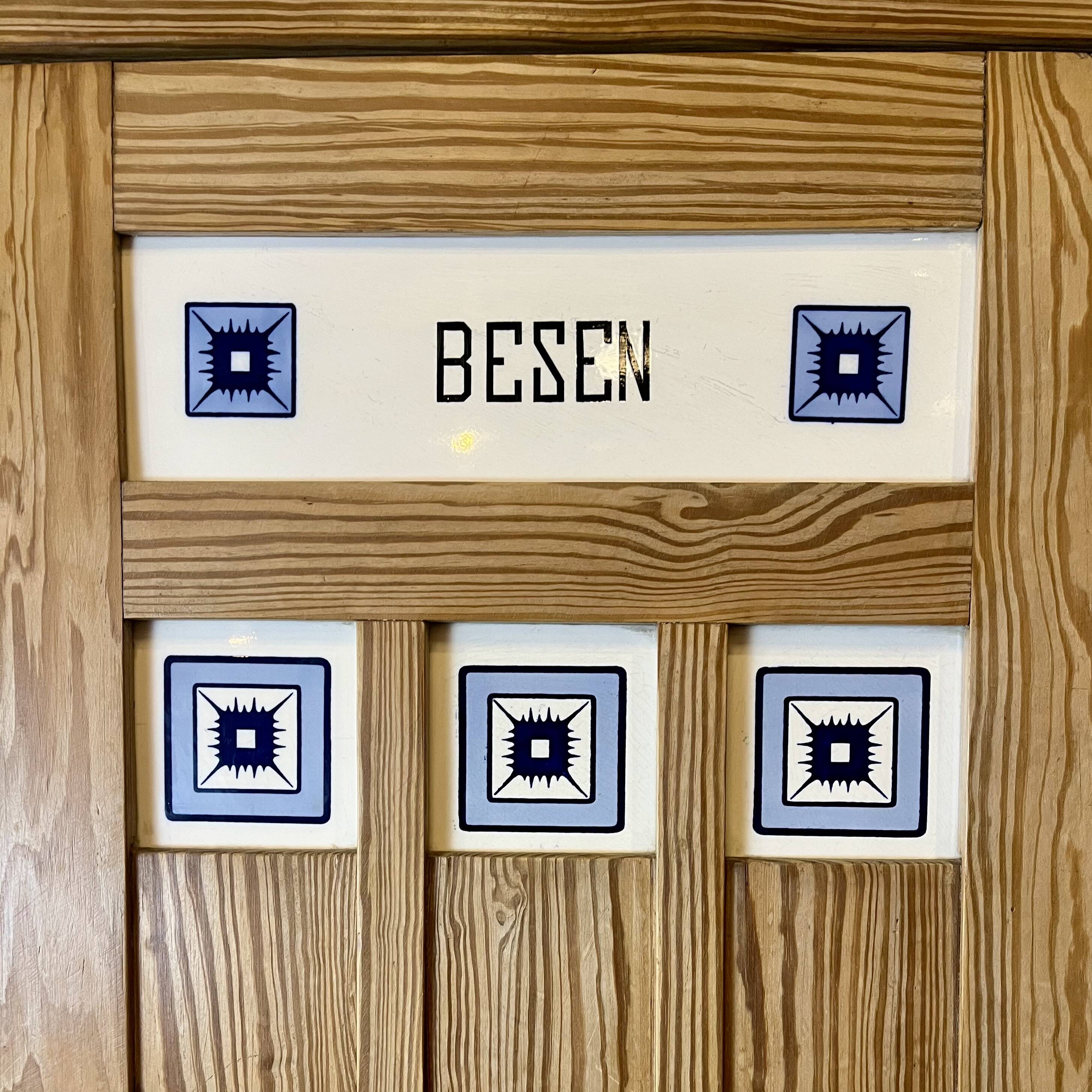 Art Nouveau wardrobe in pine with ceramic tiles, early 20th century.
