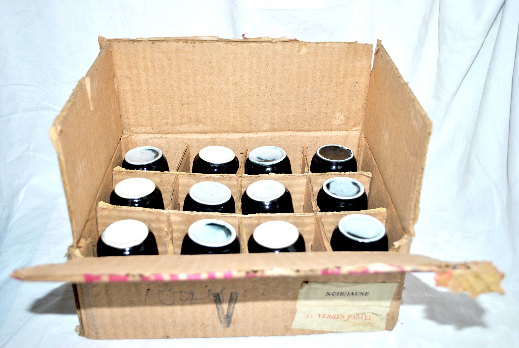12 glasses in black and yellow ceramic