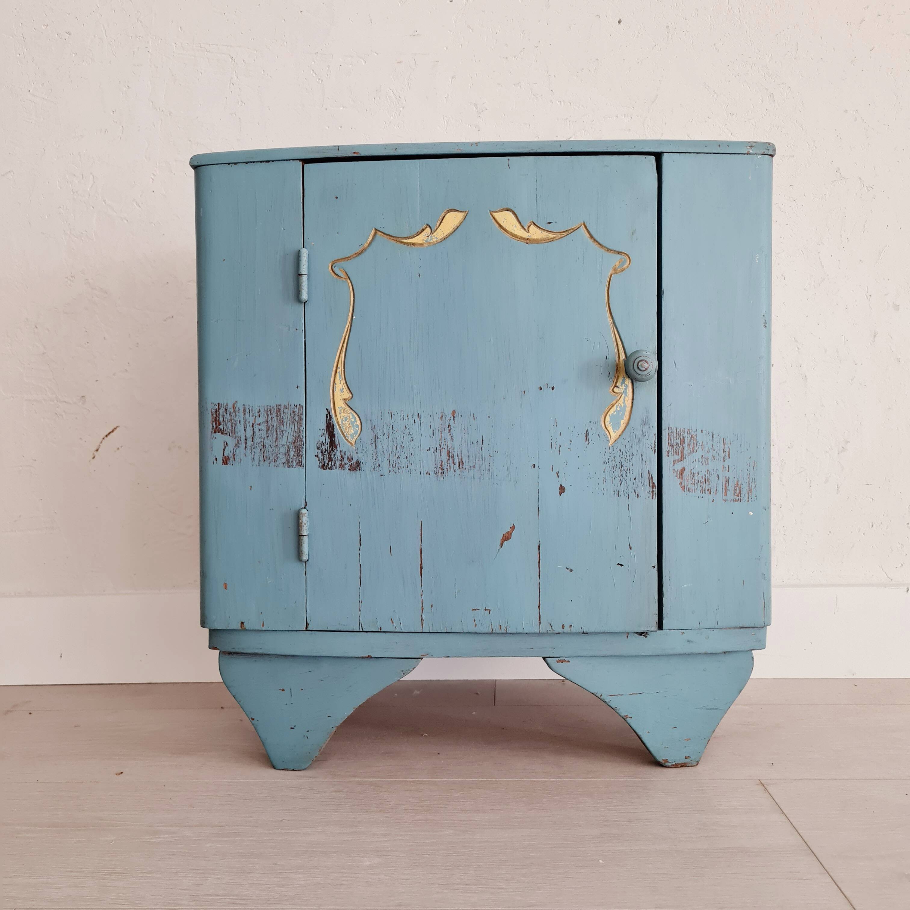 Old blue wood bedside table
