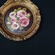 Still life in Tondo oil on panel of a bouquet of pink roses signed