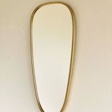 Vintage brass mirror in rear-view mirror shape