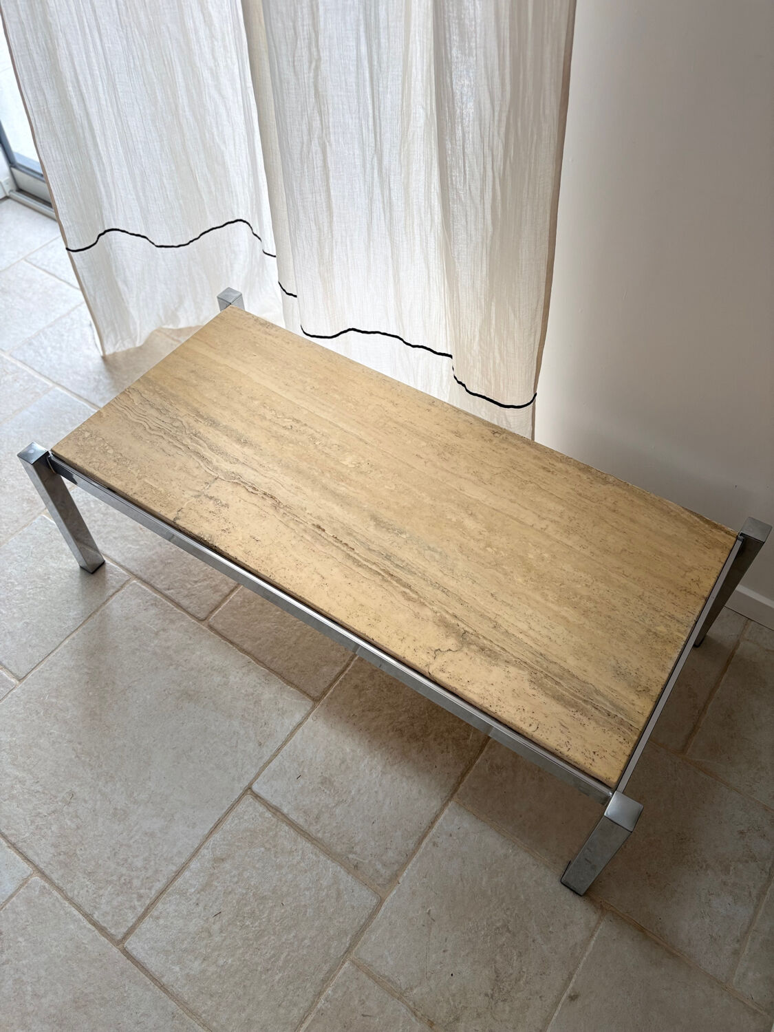 Chrome metal and travertine coffee table, 1970.