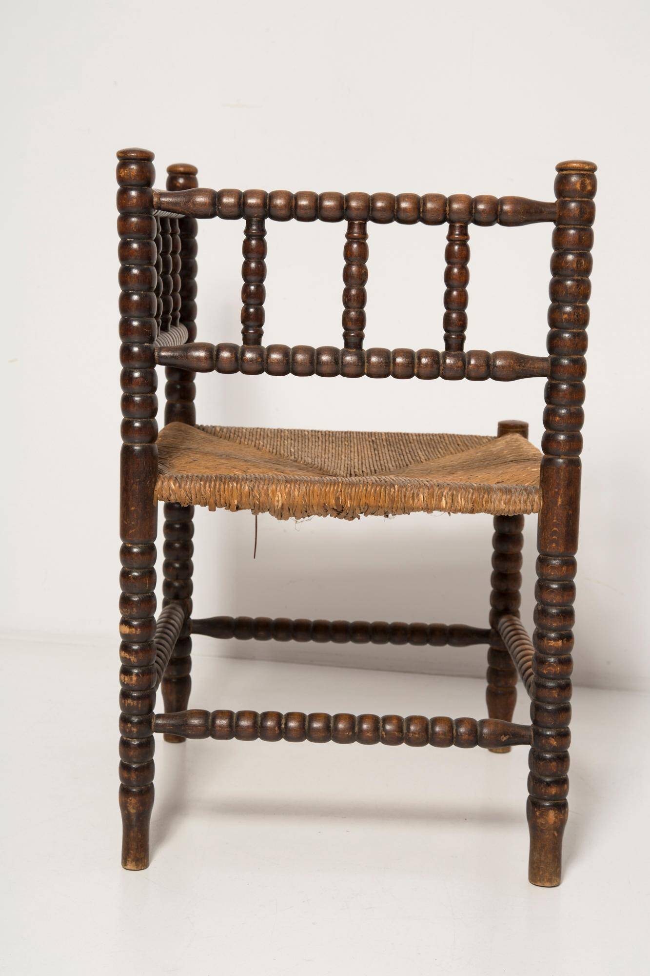 Provincial antique bobbin corner chair from the mid-century, France, 1940s.