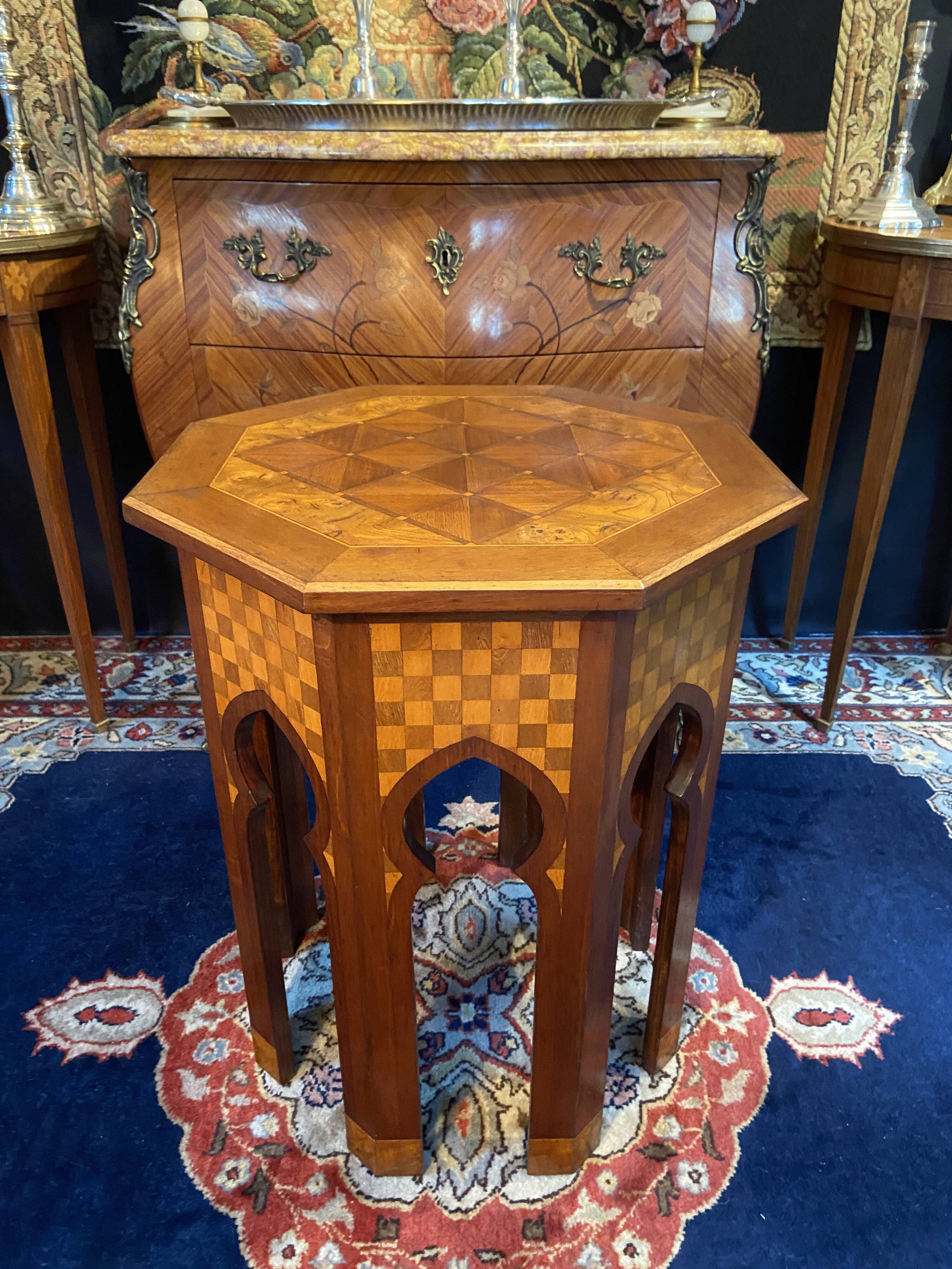 Thuyawood tea table with marquetry decoration.
