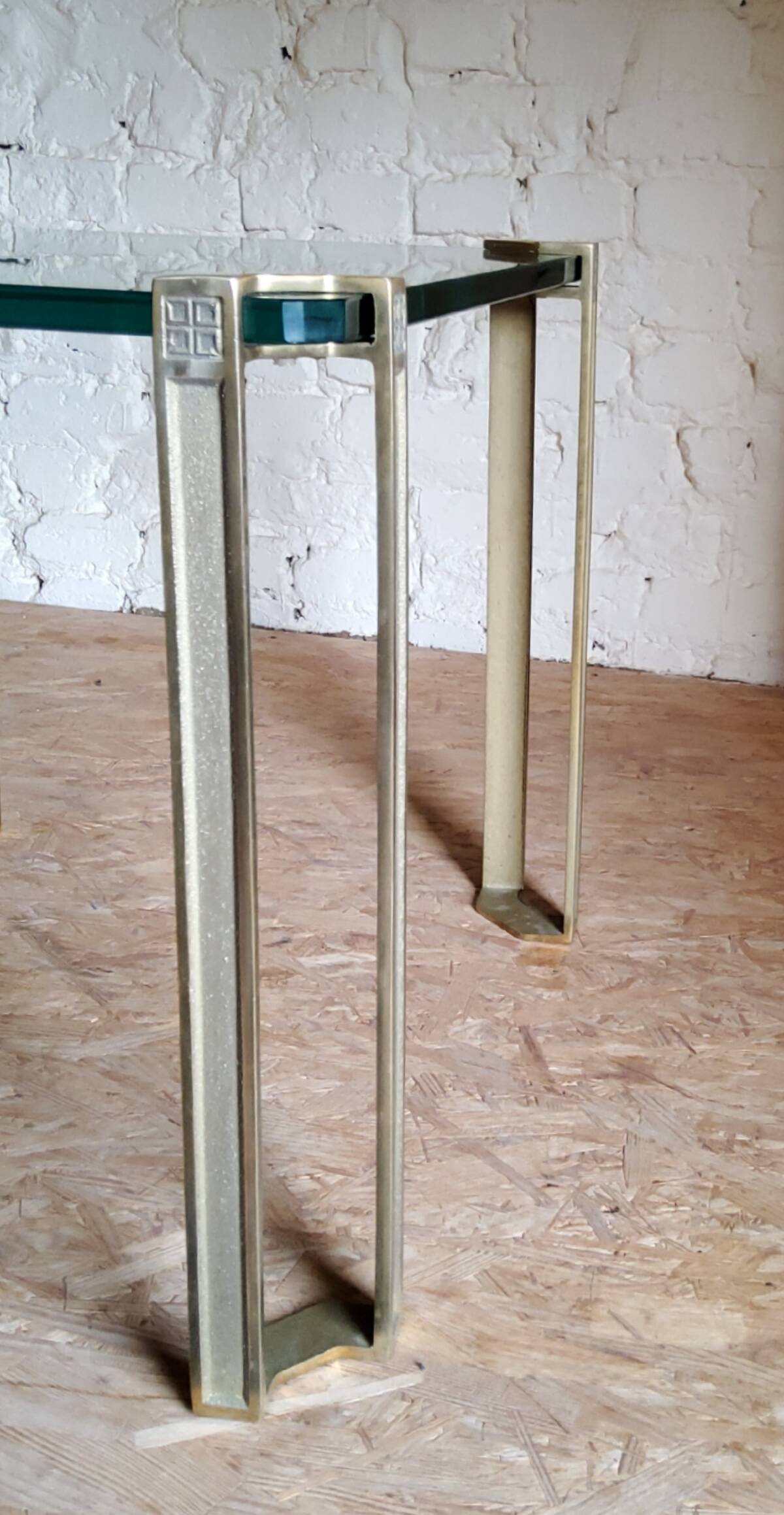 Glass and brass coffee tables by Peter Ghyczy