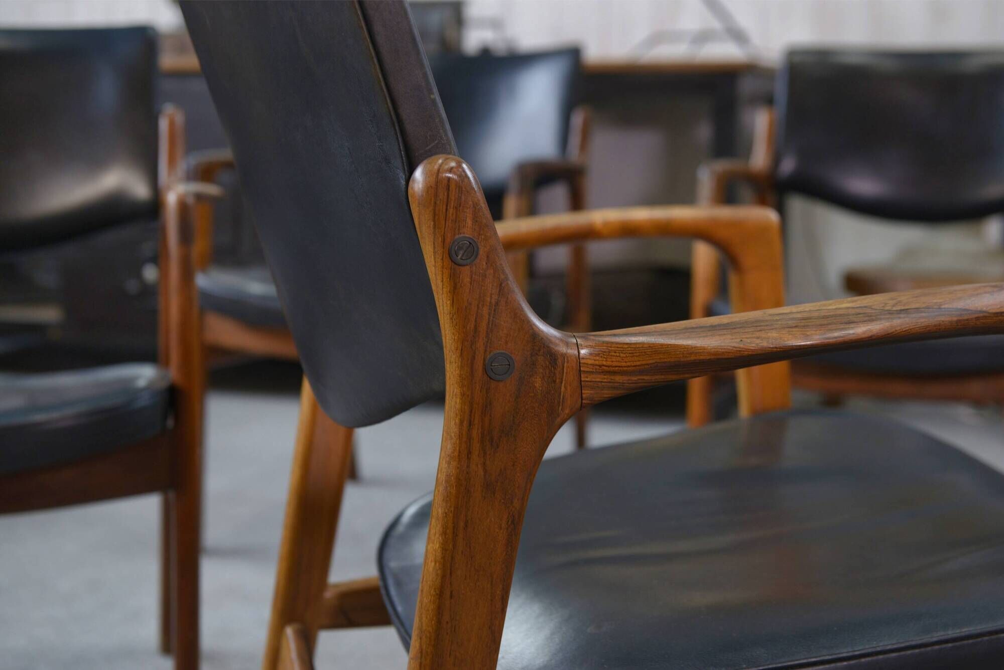 Set of 6 Scandinavian armchairs in leather and rosewood by Gondo Gravesen for Atelier Bondo Gravesen Snedkerier 1960s.