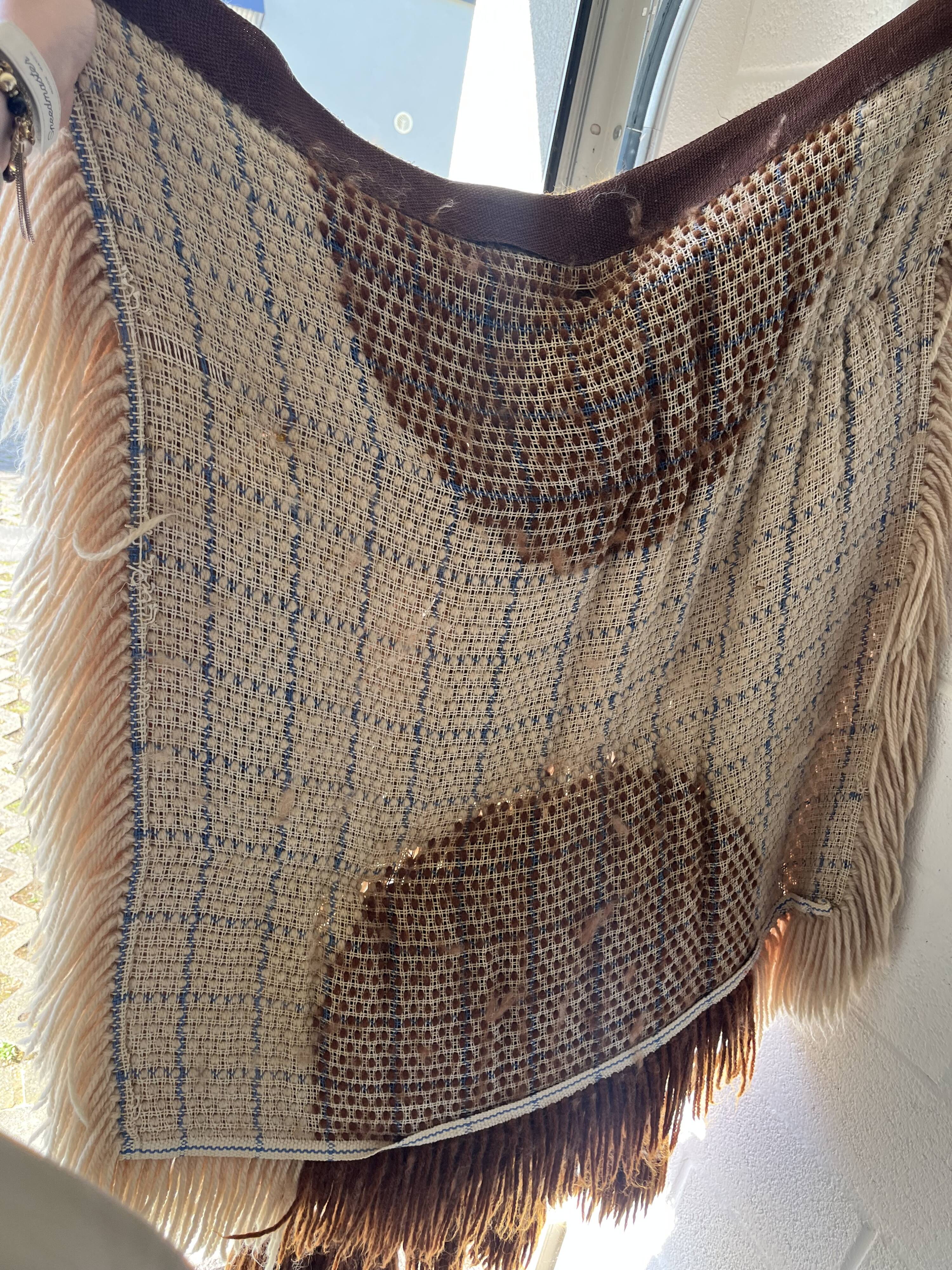 Handmade woven wool wall tapestry from the 70s and 80s, vintage macramé.